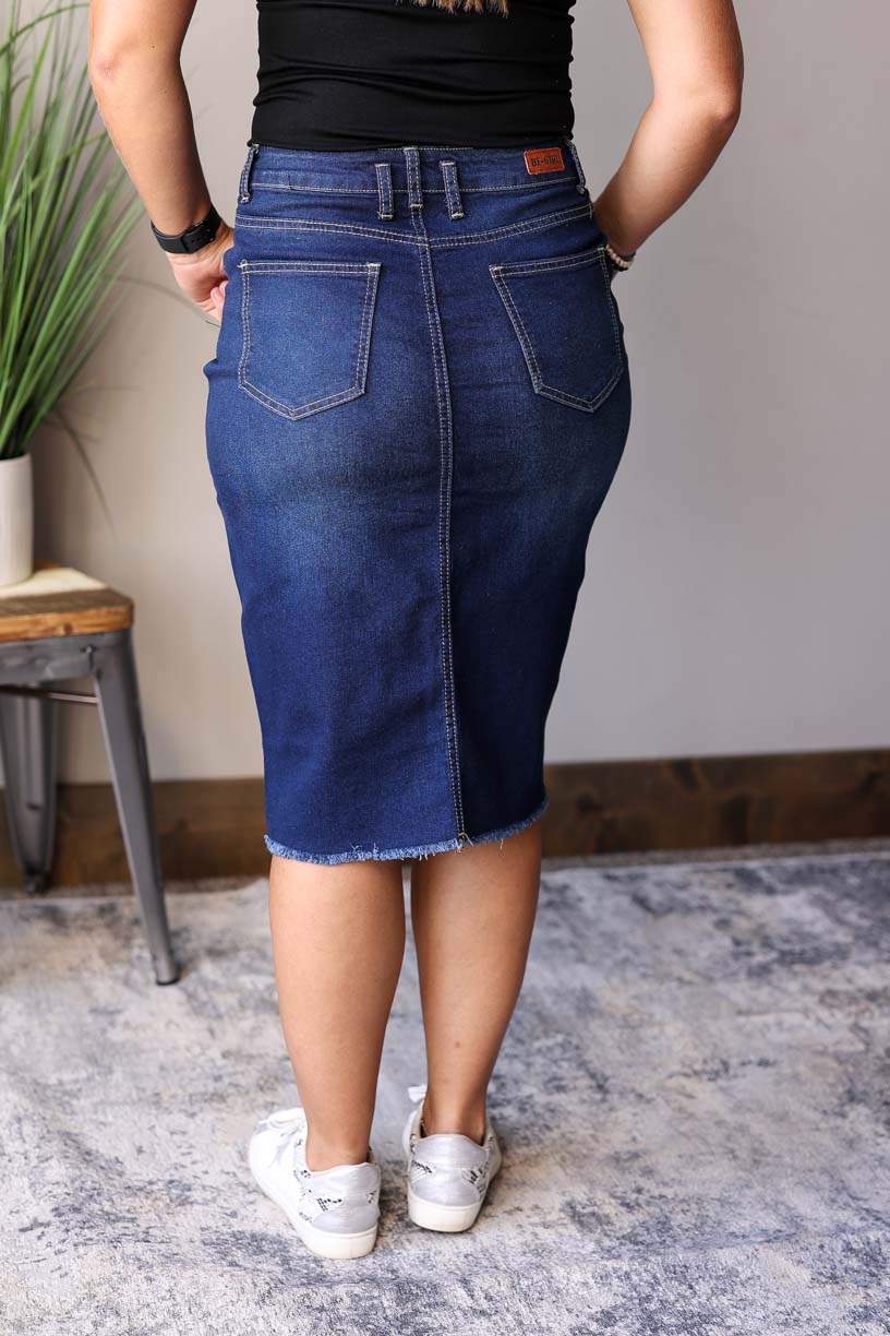 Sophia Dark Wash Skirt is perfect for any occasion from date nights to the office. It is made with a dark wash for a chic look and features a feminine waist stitching detail for fall winter fashion.