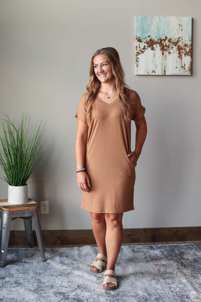 Front view of deep camel brown v-neck summer midi dress with rolled up sleeves, perfect for everyday summer casual style at Classy Closet, a women's online clothing boutique for modest fashion. 