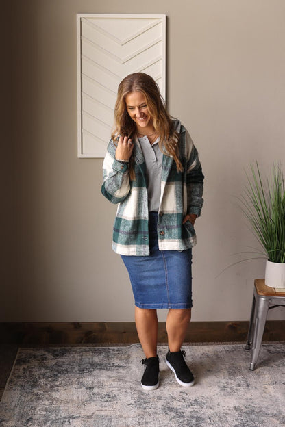 This green plaid hooded shacket is perfect for staying cozy while looking stylish. The dark green and grey tone plaid add a splash of color to any outfit. Fall Winter Fashion at Classy Closet Online Boutique