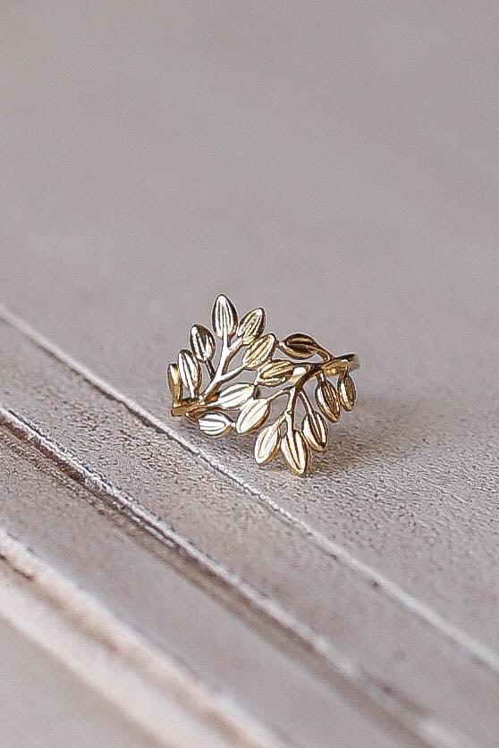 The perfect ring for summer is here. Completely adjustable, this ring is a one size fits all and will be your new favorite.

"All of our rings are gold plated stainless steel. Because stainless steel is a strong material, our pieces hold up through everyday wear and tear. No jewelry is designed for water as every time jewelry gets wet, it will slowly remove some of its platting. Every day washing hands and dishes will not affect the color of the metal but continued water exposure will eventually remove the 