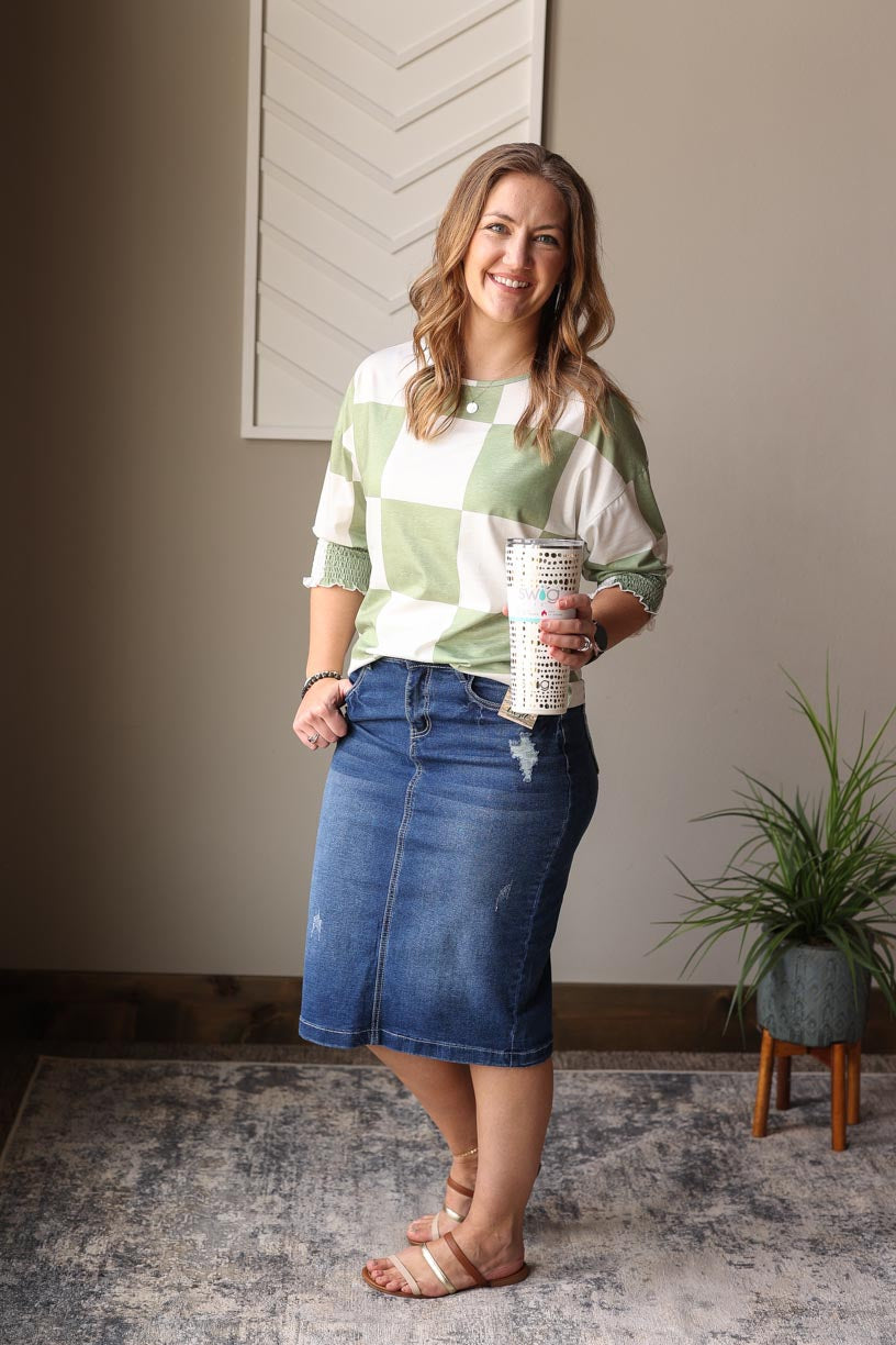 Freshen up your style with our Grass Green Checkered Top! This cute and trendy top features a large green and white plaid print and smocked elbow length sleeves, perfect for teachers, work, or a girls day out. Pair it with denim or white for a casual look, layer it with a denim jacket, or dress it up with a black, navy, or mocha pencil skirt for a more chic look.