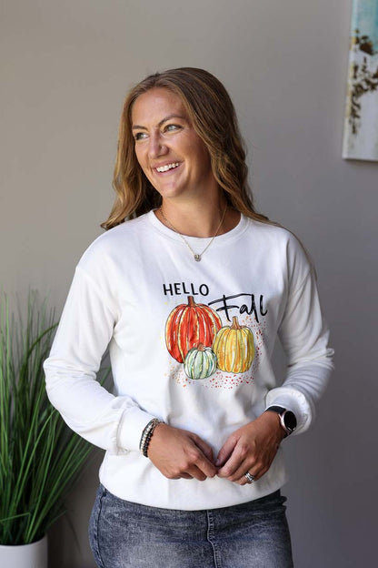 Fall in love with this cozy "Hello Fall" sweatshirt! Enjoy autumn traditions like pumpkin-picking, leaf-raking, and sipping pumpkin spice lattes while you stay toasty in this awesome pullover at CLassy Closet ONline Women's Boutique