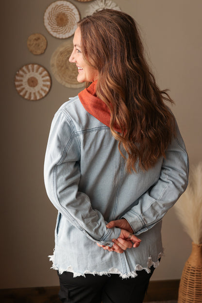 Flap pocket denim shirt jacket in sky blue paired with casual winter basics