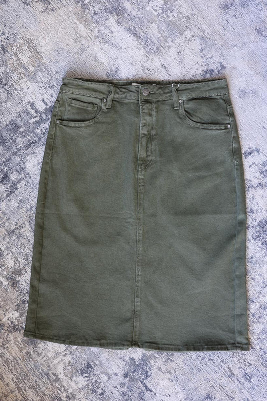 Look stylish in this moss green-colored RISEN Denim Skirt- perfect for any outfit. Features include a back slit and comfort fit for all day wear. Feel stylish and comfortable with this must-have wardrobe denim skirt with Classy Closet Online Women's Modest SKirt Boutique.