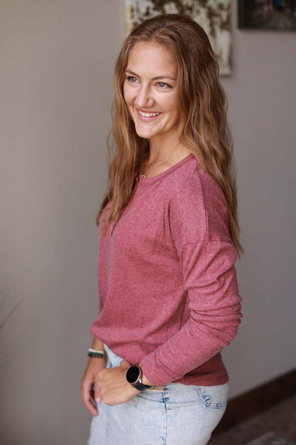 Our Dark Mauve Henley Top is perfect for everyday wear. Made for comfort, it features a henley neckline and stretchy, soft fabric. Available in sizes S-2XL PLUS, this top is an essential for your wardrobe. Classy Closet Women's Modest Fashion Boutique