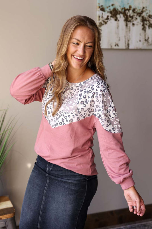 This comfy pullover top is the perfect combination of style and comfort! Its chevron of leopard and solid colorblock gives you a playful look, but the feel of a cozy, warm sweatshirt at Classy Closet for Women's Fall Winter Fashion.