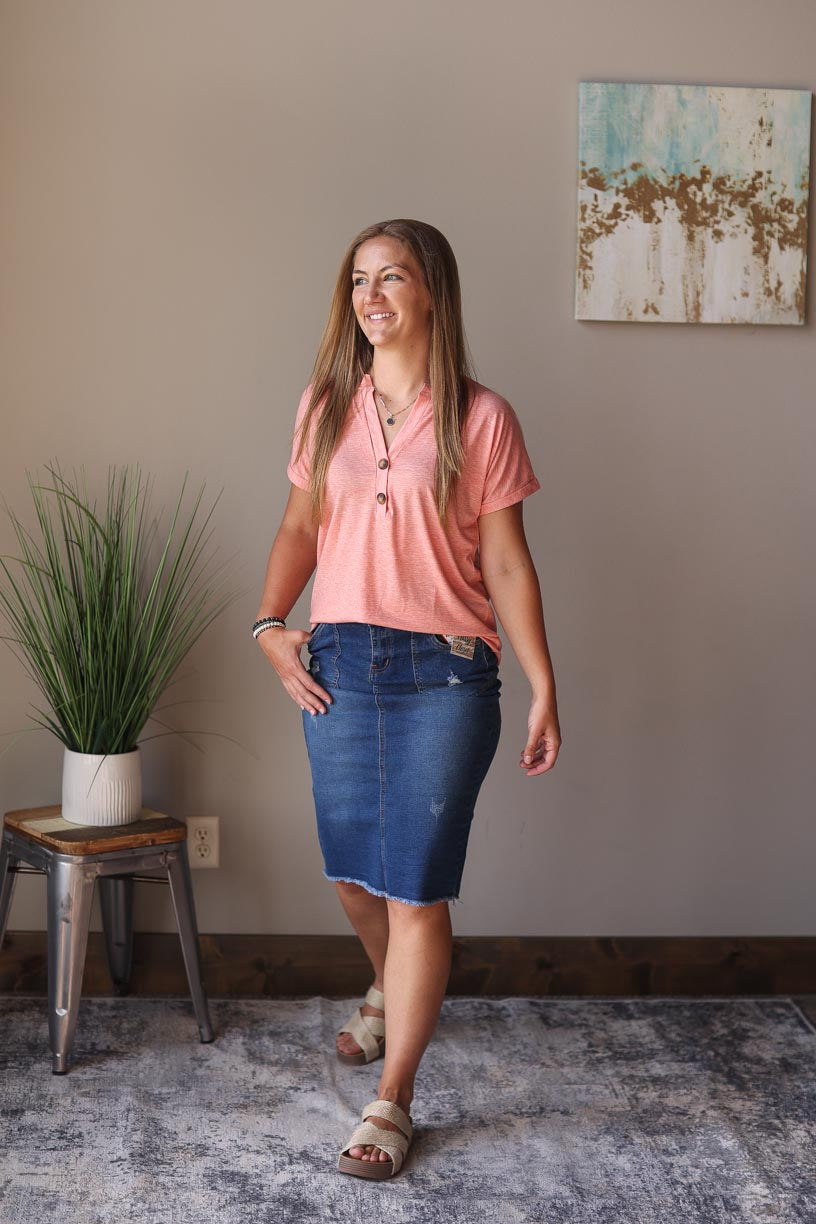 Heathered coral v-neck rolled short sleeve top with button details, perfect for cute, comfy, casual summer style at Classy Closet, a women's online modest clothing boutique.