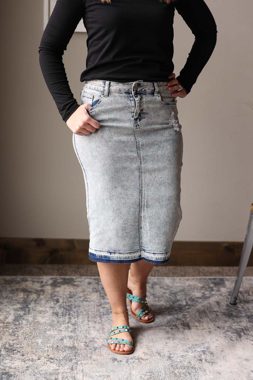 Spruce up your summer wardrobe with our Light Blue Mineral Wash Denim Skirt! The on-trend mineral wash adds a playful touch to this casual piece, while the cute back pockets add functionality. Perfect for all your summer adventures.
