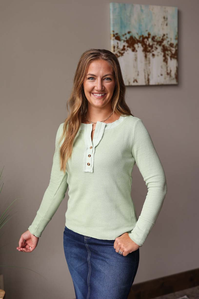 Mint Textured Henley Top is perfect for adding a pop of color to your winter wardrobe. It's made of a thermal waffle texture that provides warmth and a comfortable fit. It is a perfect layering piece for any casual winter outfit. Classy Closet Women's Online Boutique for Modest Fashion