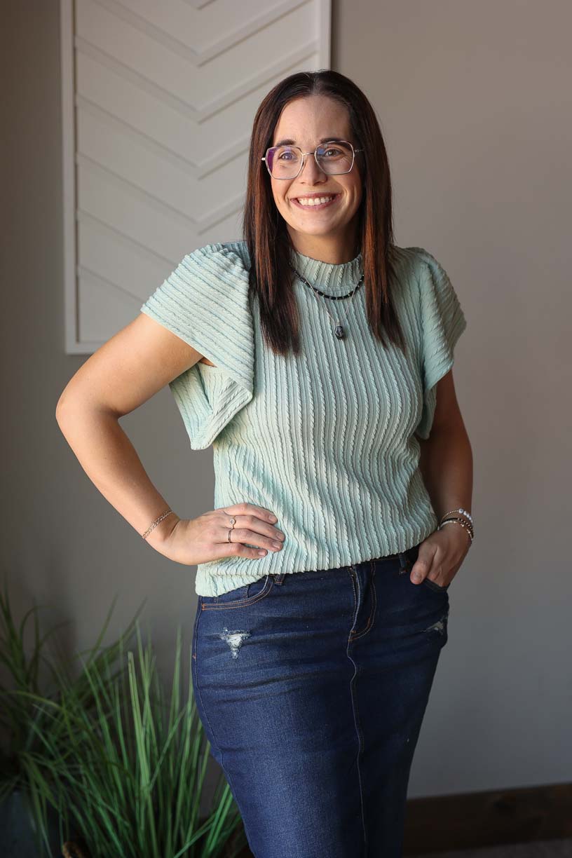 Elevate your wardrobe with our Sage Textured Flutter Sleeve Top! This pretty and feminine top features ruffle sleeves and a textured ribbed design, adding a touch of chic to any outfit. Perfect for work, occasions, church, and more, it's versatile and stylish. Upgrade your chic + comfortable outfit choices today! Classy CLoset online women's clothing boutique for modest fashion and affordable trendy mom outfit styles.