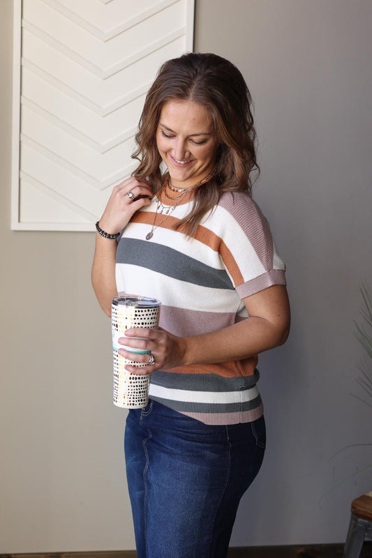 This camel striped short sleeve sweater features all your favorite neutrals in a chic and versatile design perfect for work, date night, church, and more. Stay comfortable and on trend with this must-have piece.