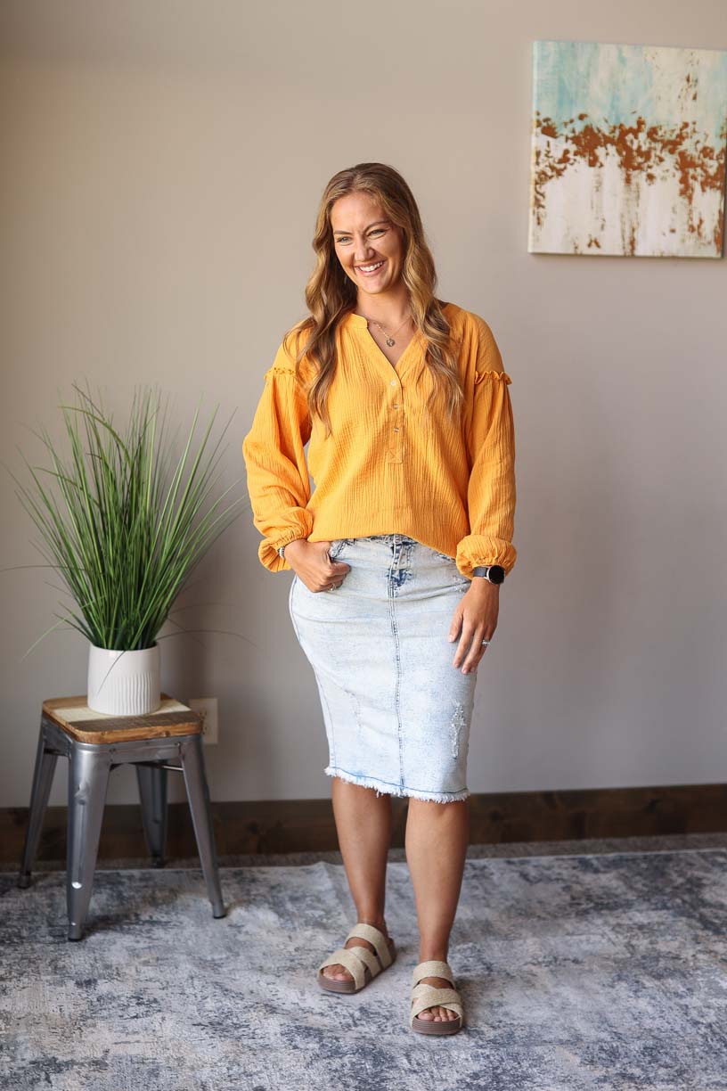 Our Mustard Balloon Long Sleeve Crinkled Top is here to make you look and feel amazing! Made with a soft, gauze-like material, this top is so comfortable and breezy that you’ll feel ready to take on the office or a day out with the girls. Who says fashion can’t be comfortable?