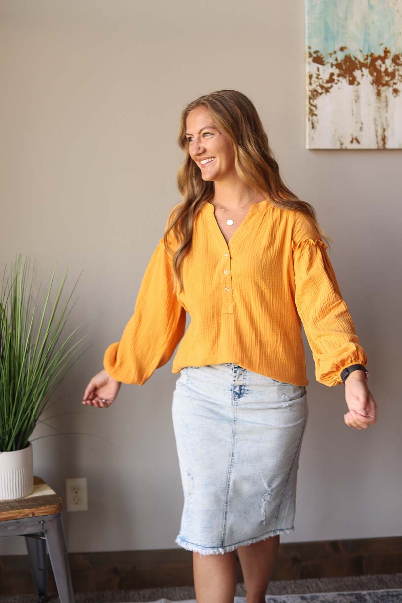 Our Mustard Balloon Long Sleeve Crinkled Top is here to make you look and feel amazing! Made with a soft, gauze-like material, this top is so comfortable and breezy that you’ll feel ready to take on the office or a day out with the girls. Who says fashion can’t be comfortable?