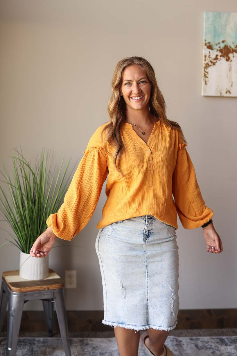 Our Mustard Balloon Long Sleeve Crinkled Top is here to make you look and feel amazing! Made with a soft, gauze-like material, this top is so comfortable and breezy that you’ll feel ready to take on the office or a day out with the girls. Who says fashion can’t be comfortable?