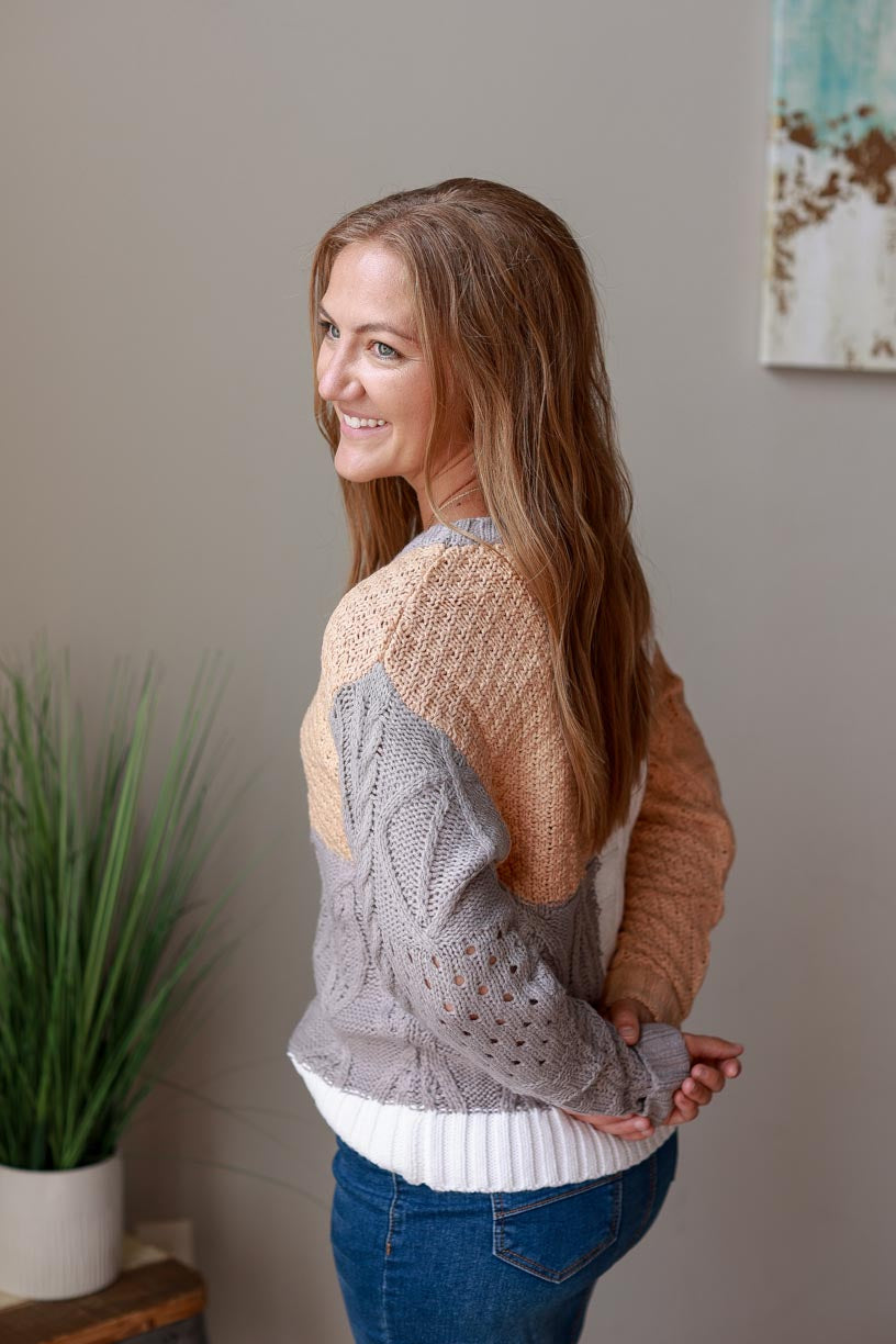 Stay warm and stylish in this Camel Colorblock Sweater. The neutral hues and cozy texture make this the perfect piece to transition from work to weekend (in unbeatable comfort, no less!). Classy Closet Women's Fashion Boutique