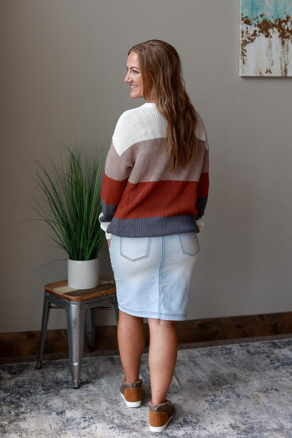 Autumn Colorblock Crewneck Sweater offers comfort and style for any occasion. It features the perfect colors of ivory, rust, blue, and tan for the season. It's designed to fit perfectly, with amazing length without looking bulky at Classy Closet Women's Fashion Boutique Near ME