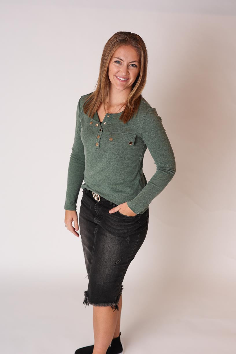 Wrapped in the warmth of comfortable olive green, this Moto Snap Henley Top is an essential this season of cute cold weather outfits at Classy Closet, a women's online clothing boutique for modest fashion. 