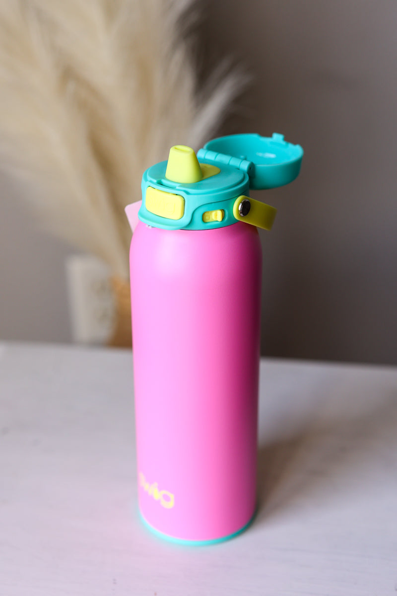 Pink water bottle SWIG EZ Fill with a colorful lid on a light surface.