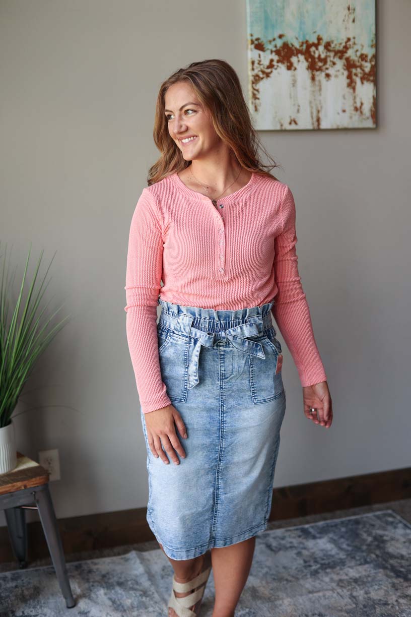 Front view of coral textured long sleeve henley top, perfect for a stylish and comfortable fall outfit at Classy Closet, a women's online modest fashion clothing boutique in Iowa.