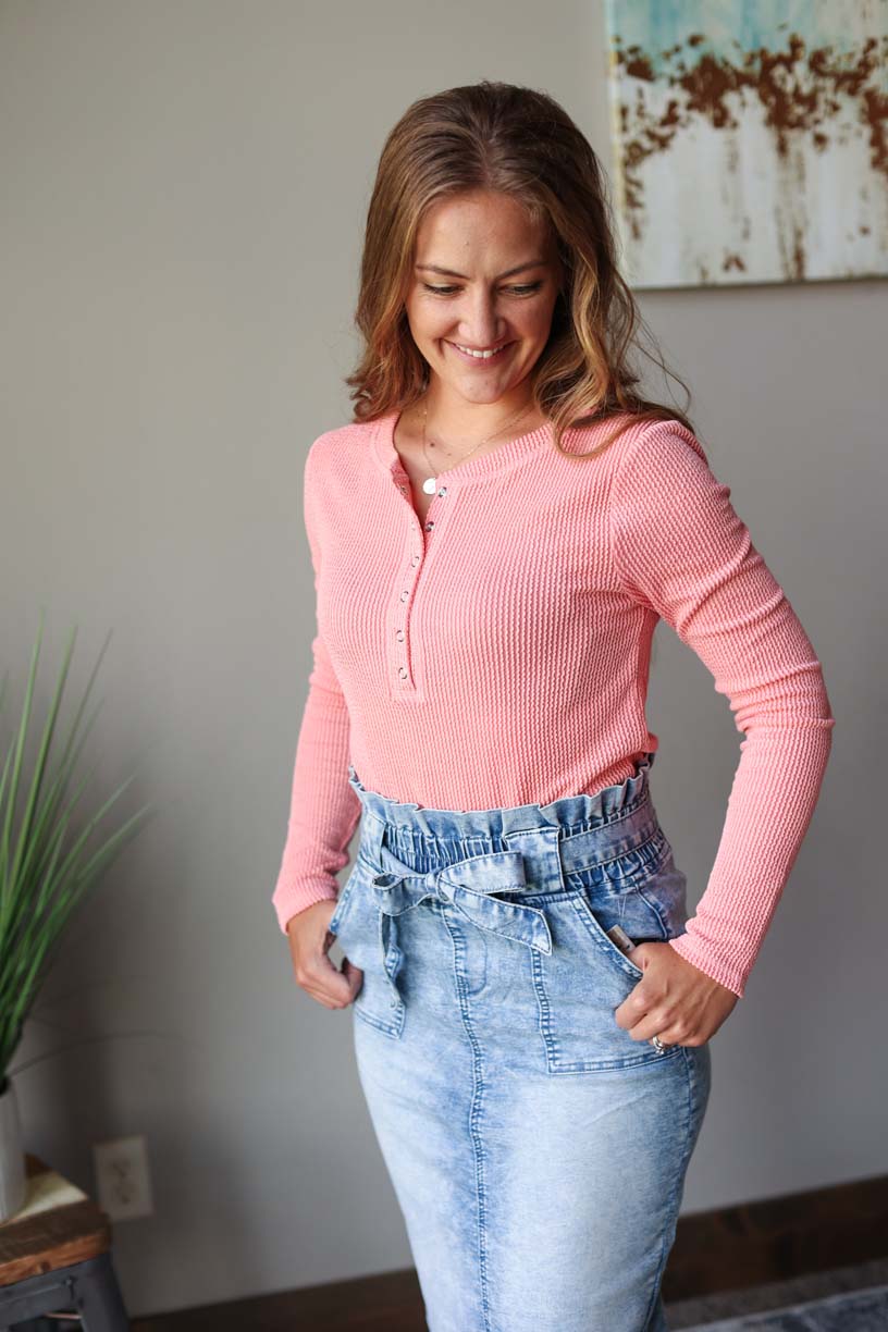 Front view of coral textured long sleeve henley top, perfect for a stylish and comfortable fall outfit at Classy Closet, a women's online modest fashion clothing boutique in Iowa.