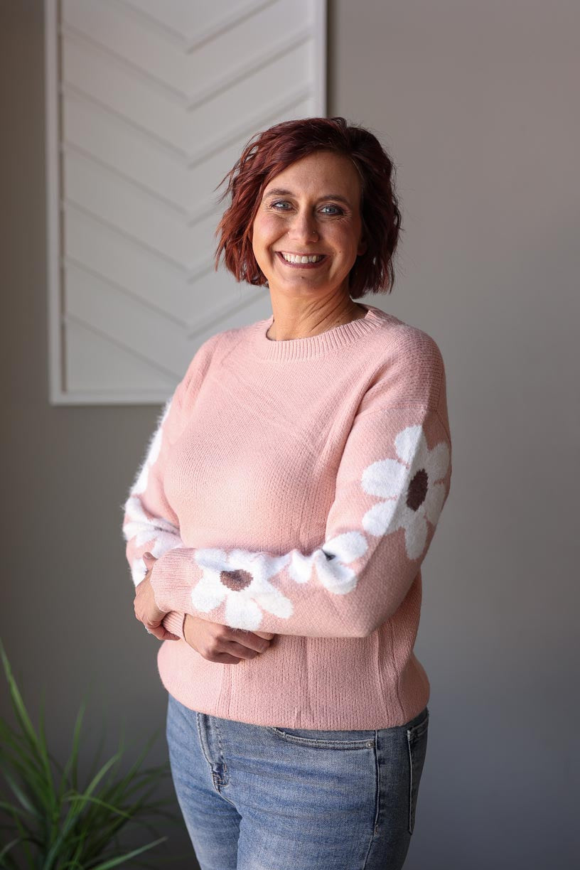 Stay warm and stylish with our Dusty Pink Flower Sleeve Spring Sweater! Combining simplicity and cuteness, this sweater is the perfect addition to your wardrobe. Its cheerful design will brighten up your day while keeping you cozy. Say goodbye to cold temps and hello to effortless fashion! Classy Closet online women's clothing boutique for cute mom outfits & modest fashion. Hull, Iowa