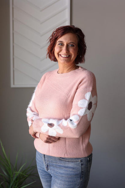 Stay warm and stylish with our Dusty Pink Flower Sleeve Spring Sweater! Combining simplicity and cuteness, this sweater is the perfect addition to your wardrobe. Its cheerful design will brighten up your day while keeping you cozy. Say goodbye to cold temps and hello to effortless fashion! Classy Closet online women's clothing boutique for cute mom outfits & modest fashion. Hull, Iowa