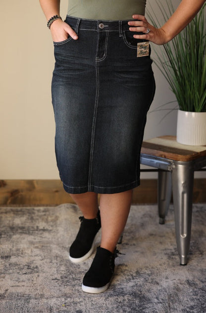 The Piper Denim Skirt is a classic piece with a modern twist. The solid black wash and white stitching detail will add effortless style to your everyday look. Whether you're at home, school, or brunch, this skirt will be a staple of your modest outfits