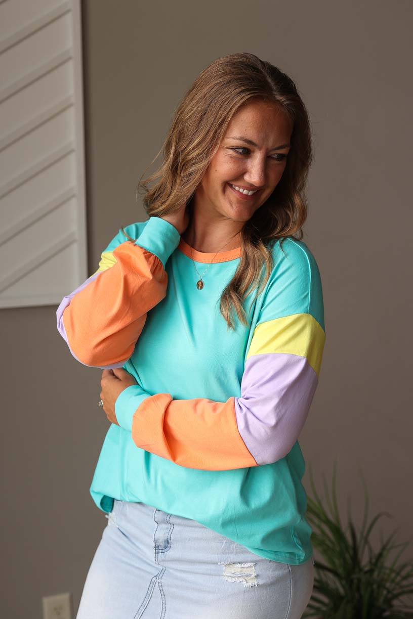 Get ready to update your everyday style with our Light Blue Colorblock Top! This adorable and lightweight long sleeve top features colorblock stripes that add a fun and cheerful touch to any outfit. Stay relaxed and comfortable all day while looking cute and stylish. Classy Closet back to school outfits for modest fashion online boutique and everyday casual outfits