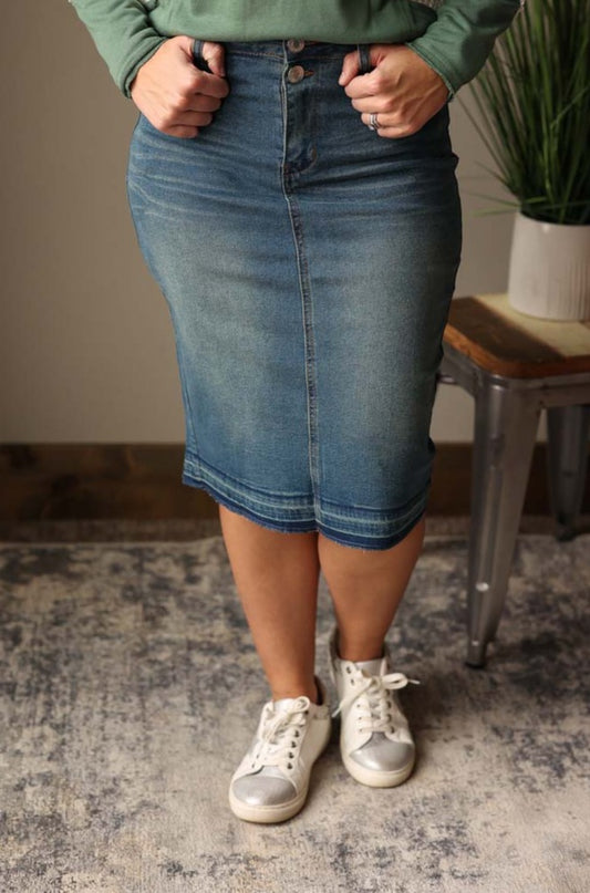 Effortlessly finish off your front tuck outfit look with our Two Button Fly Pencil Denim Skirt. Featuring a unique 2 button fly detail, this skirt adds those little details that make a big difference. Classy Closet Modest Women's Cute Spring Outfits for Casual Fashion