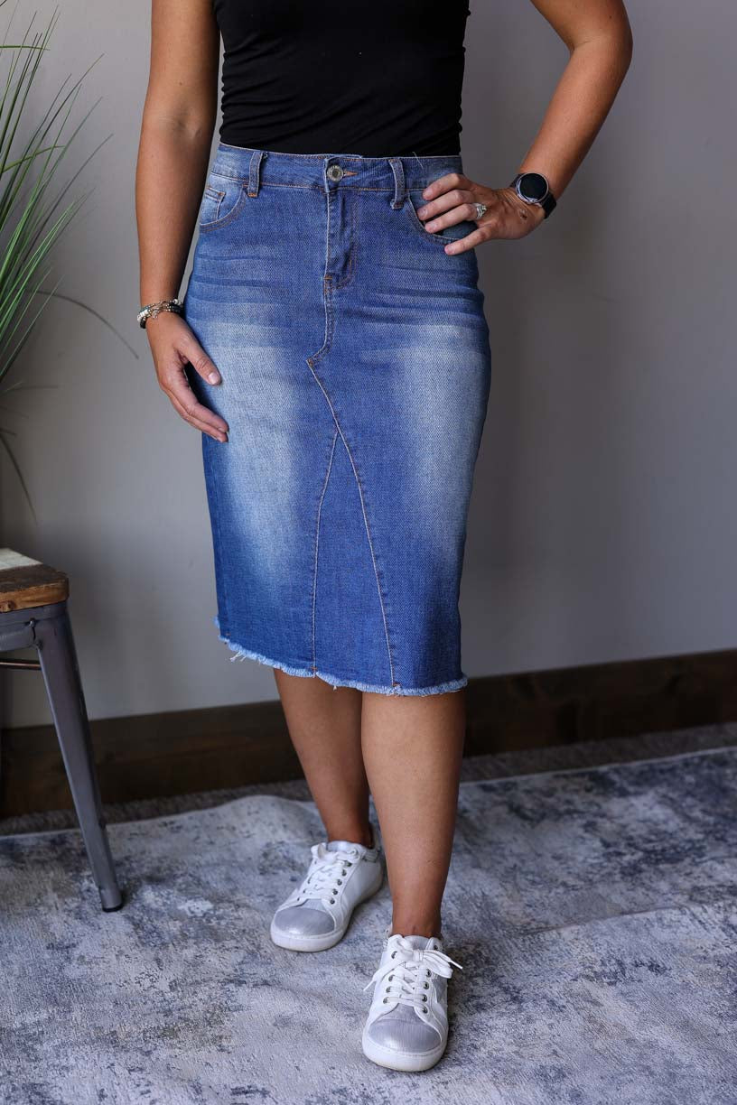 This Everyday Comfort Stretch Denim Skirt is an absolute must-have. Its A-line fit gives you a great look while the stretchy and comfy denim fabric provides all day comfort for fall winter fashion at Classy Closet's Online Modest Boutique.