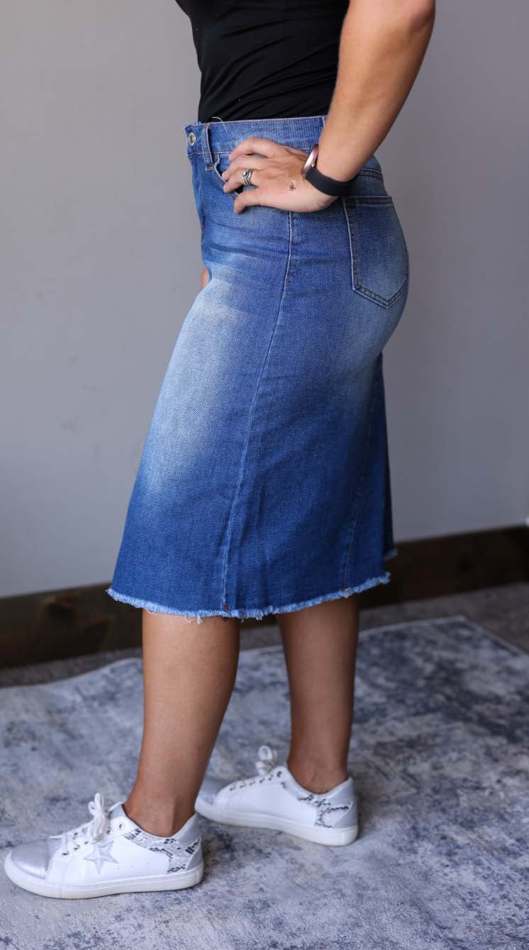 This Everyday Comfort Stretch Denim Skirt is an absolute must-have. Its A-line fit gives you a great look while the stretchy and comfy denim fabric provides all day comfort for fall winter fashion at Classy Closet's Online Modest Boutique.