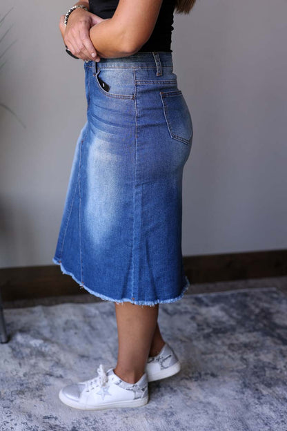 This Everyday Comfort Stretch Denim Skirt is an absolute must-have. Its A-line fit gives you a great look while the stretchy and comfy denim fabric provides all day comfort for fall winter fashion at Classy Closet's Online Modest Boutique.