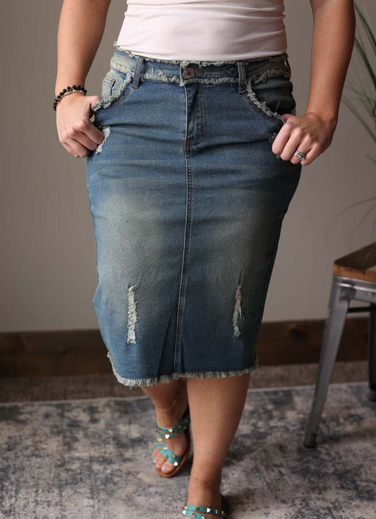 Upgrade your casual style with our Distressed Fray Edge Hem Stretch Denim Skirt! The cute fray edge details give your look a fun and chic touch, while the stretch denim ensures comfortable wear. Perfect for a happy and simple vibe.