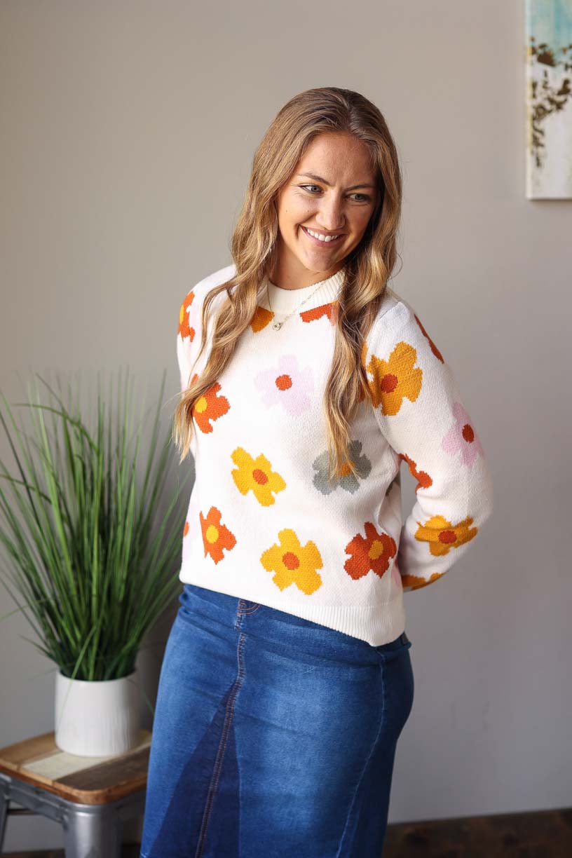 Feel your confident and chic side with this White Autumn Flower Sweater! Delivering top-notch quality, this cozy sweater adds a cute and lively touch to your fall wardrobe. From comfortable fit to charming print, this is a sweater you can't go wrong with to feel cute and trendy no matter where you go! So why wait? Get yours today and feel your confidence!