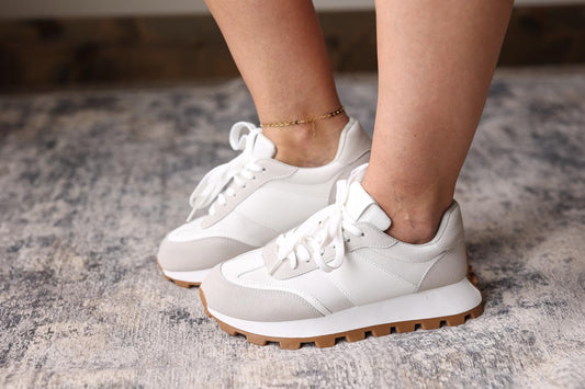 Get ready for compliments with these trendy and sporty Ivory Lug Sole Sneakers! Not only are they cute, but they're also incredibly comfortable, keeping your feet cushioned all day long. The perfect color combo makes it easy to pair with any outfit for a put-together and stylish look.