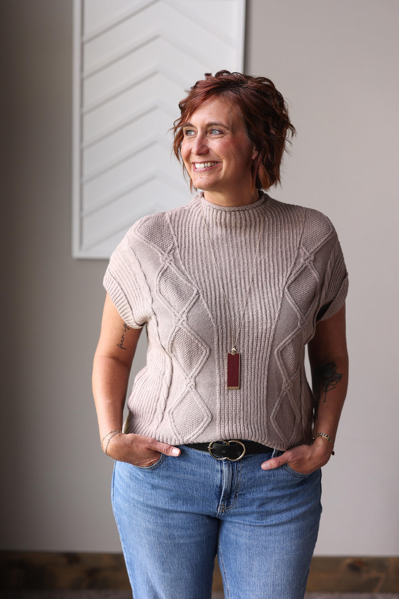 Stay comfortable and stylish from summer to fall to winter with our Smoke Grey High Neck Short Sleeve Sweater, featuring a soft, stretchy fabric and a textured design that works alone or layered.