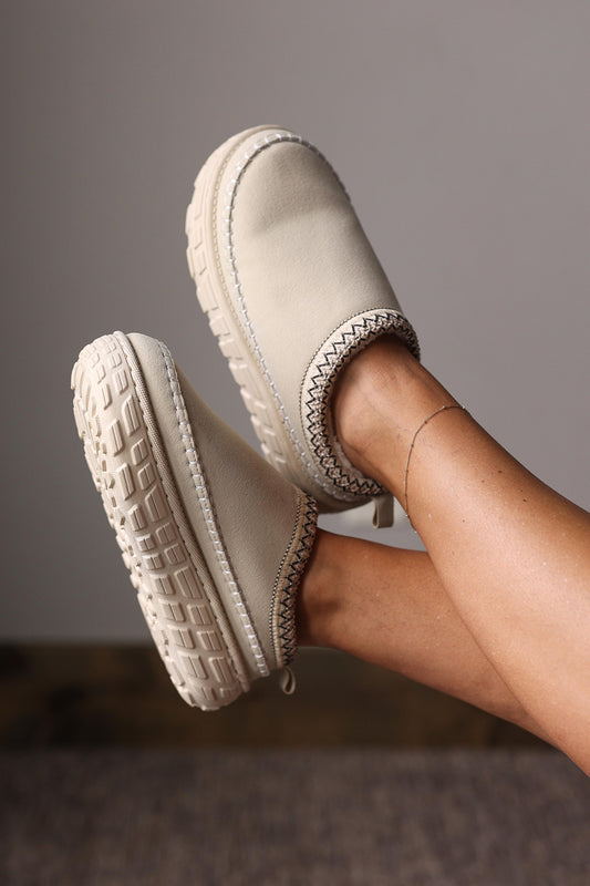 White Contrast Stitch Faux Suede Clogs are your go-to slip-on shoes for cozy comfort and effortless style during chilly fall and winter days.