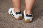 black white gum sole sneaker for everyday comfort mom outfits