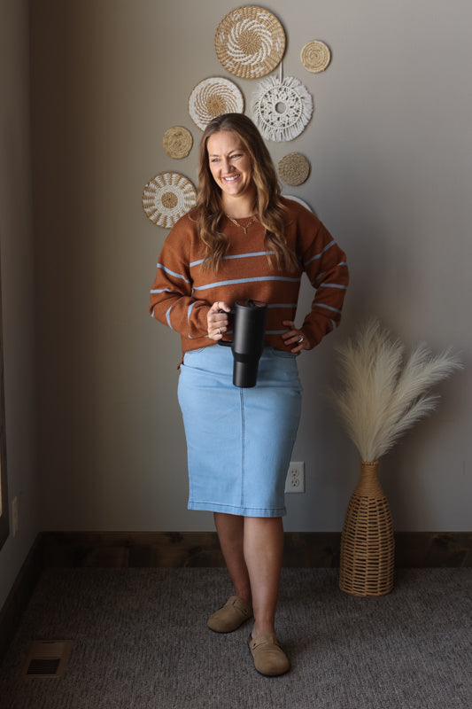 Camel blue stripe crewneck sweater styled for a cozy modest winter outfit, perfect for casual mom everyday wear and modest fashion