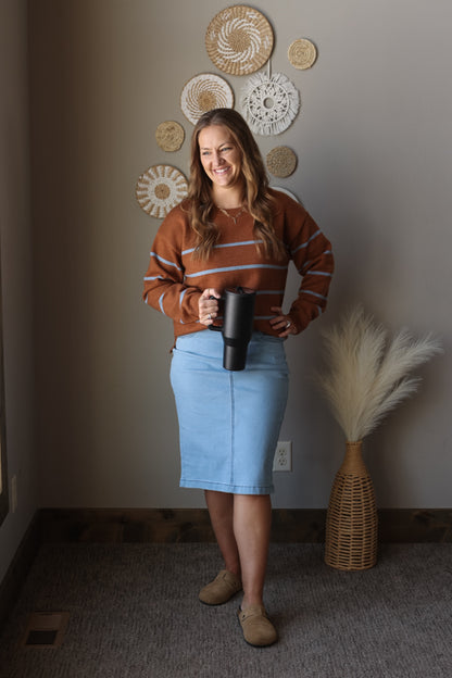 Camel blue stripe crewneck sweater styled for a cozy modest winter outfit, perfect for casual mom everyday wear and modest fashion