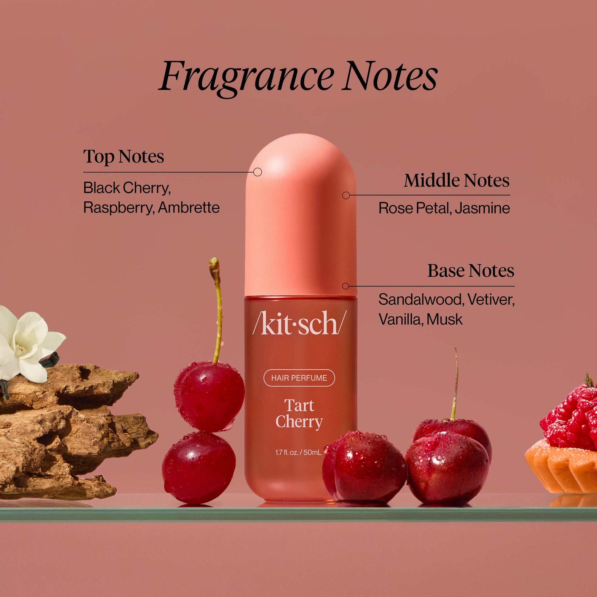 Kit-sch Tart Cherry hair perfume with fragrance notes on a pink background