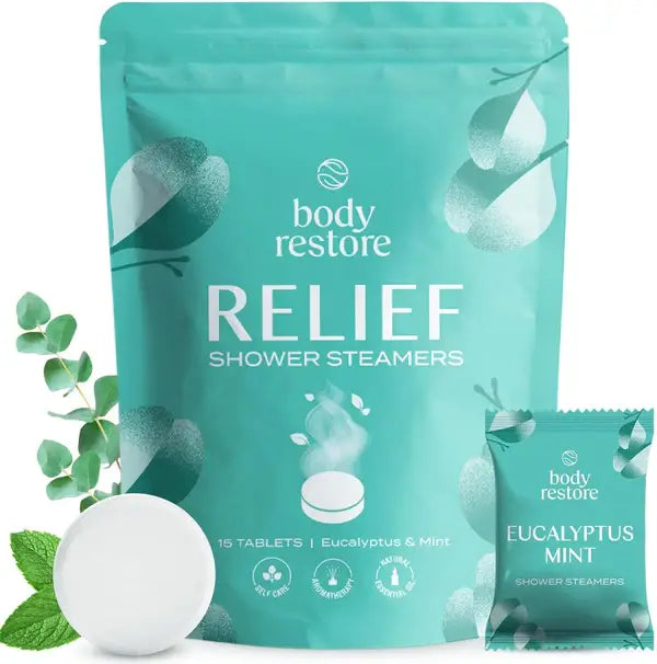 Body Restore Relief Shower Steamers packaging with a single tablet and eucalyptus leaves on a white background, great for busy mom life.