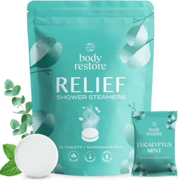 Body Restore Relief Shower Steamers packaging with a single tablet and eucalyptus leaves on a white background, great for busy mom life.