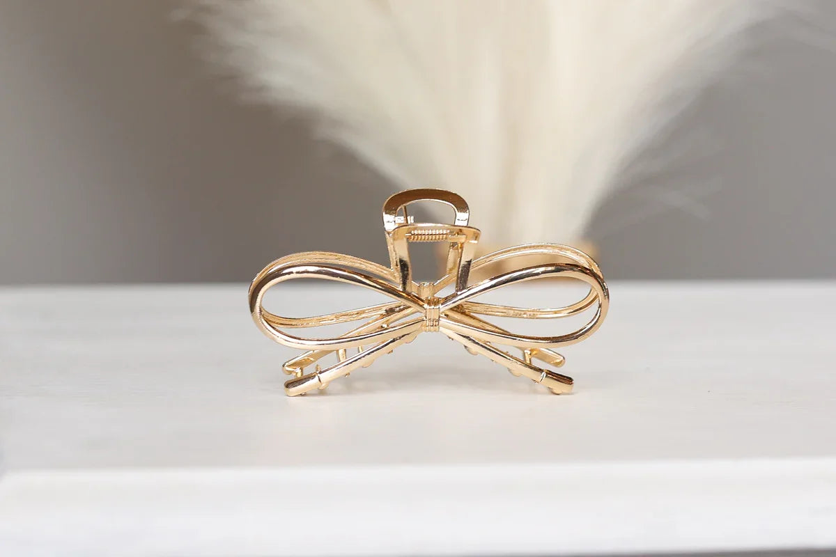 gold bow claw clip