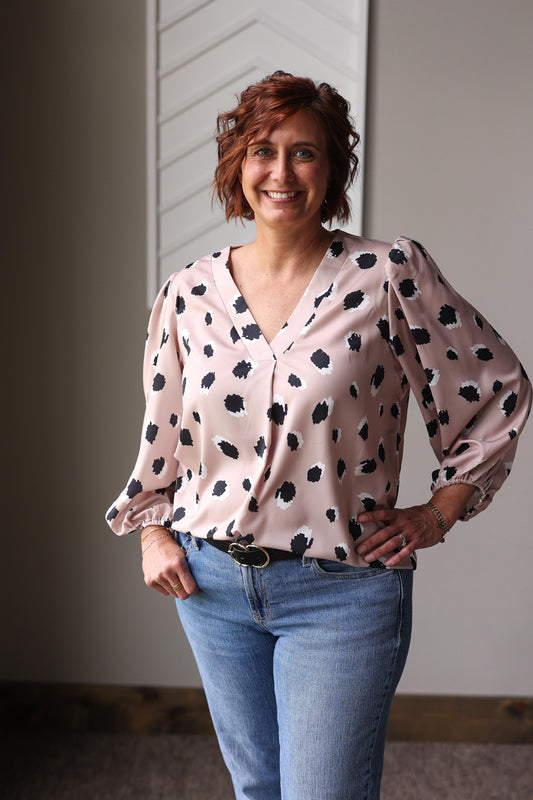 The Khaki Leopard Bracelet Sleeve Blouse effortlessly blends trendy leopard print with comfortable khaki tones, perfect for elevating your everyday and special occasion fall/winter outfit looks.