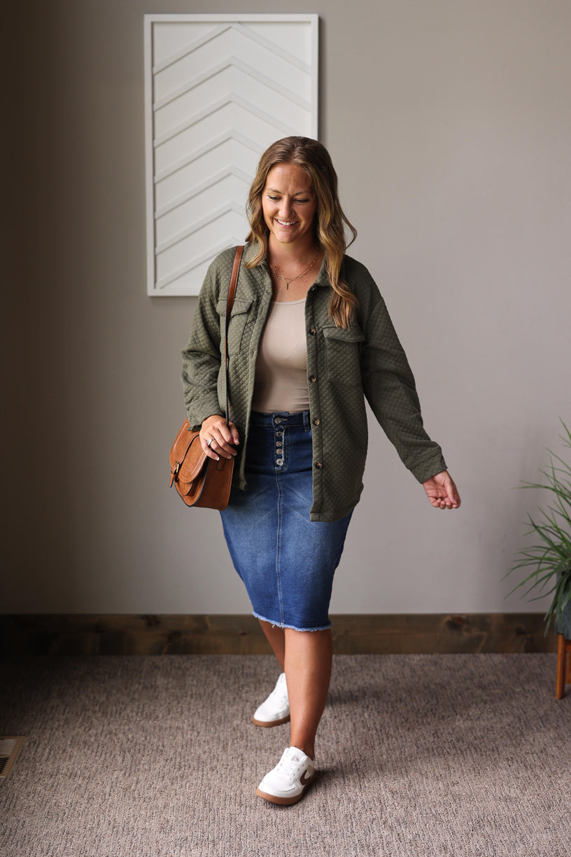 Stay warm and stylish all season with our Olive Green Quilted Shacket, the perfect cozy layer for any outfit.