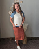 grey denim contrast short sleeve patchwork summer top with orange rust colored denim midi skirt showing the patchwork detail