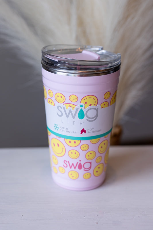 Stay refreshed on the go with the Pink Smiley Face 24oz SWIG Party Cup Tumbler, designed for convenience and style.&nbsp;
