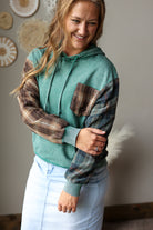 smoke green hooded mineral wash sweatshirt with unique flannel plaid patchwork details