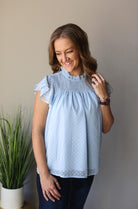 SWISS DOT BABY BLUE SMOCK RUFFLE TOP FOR WOMEN SPRING SUMMER OUTFITS CLASSY CLOSET BOUTIQUE NEAR ME